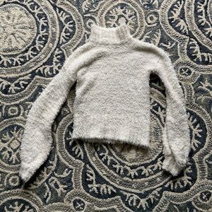 White fuzzy turtleneck